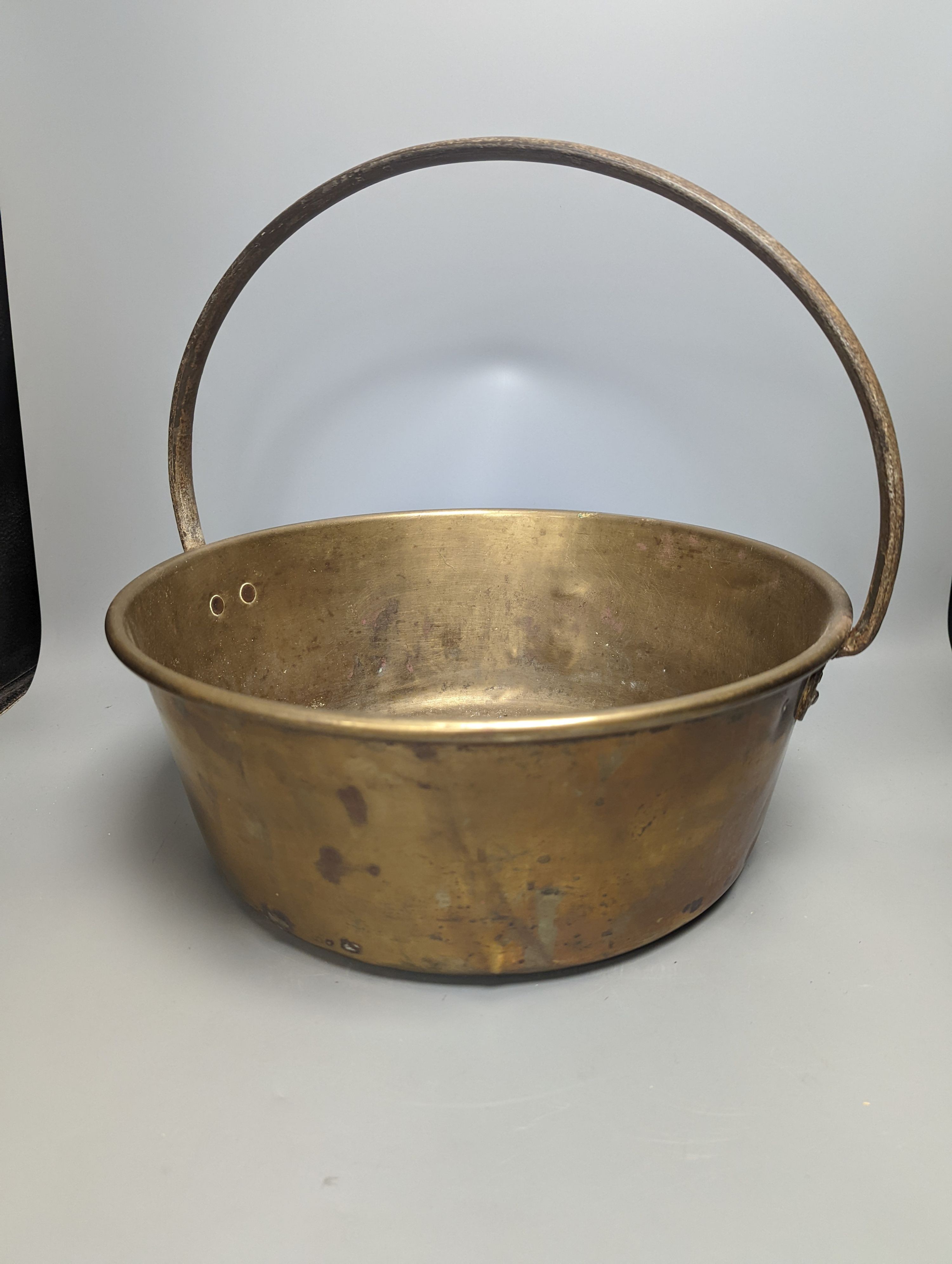 A studded copper pail, a coopered oak jug and other copper and brass wares, coopered jug 28cm high